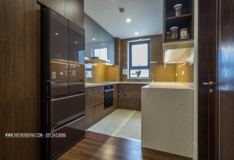 Hệ thống tủ được làm với 2 loại gỗ công nghiệp đó là gỗ MDF và gỗ acrylic bóng gương tạo nên sự sang chảnh và tiện nghi cho căn bếp. Thiết kế phòng bếp, tủ bếp gỗ An Cường