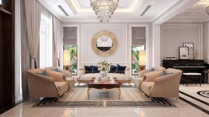 Bộ bàn ghế sofa tân cổ điển mạ vàng tone trắng sữa nhẹ nhàng nhưng lại tạo điểm nhấn đẹp, sang trọng cho phòng khách. Thiết kế nội thất phòng khách nhà phố