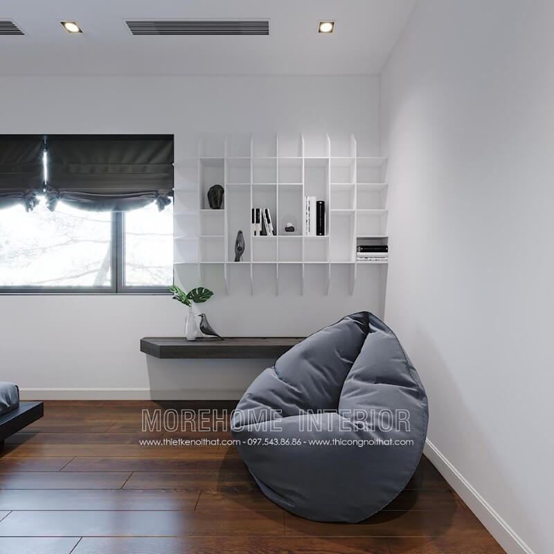 Ghế lười êm ái với kiểu dáng độc đáo cho không gian đọc sách trong phòng ngủ hiện đại. Thiết kế phòng ngủ nhà phố