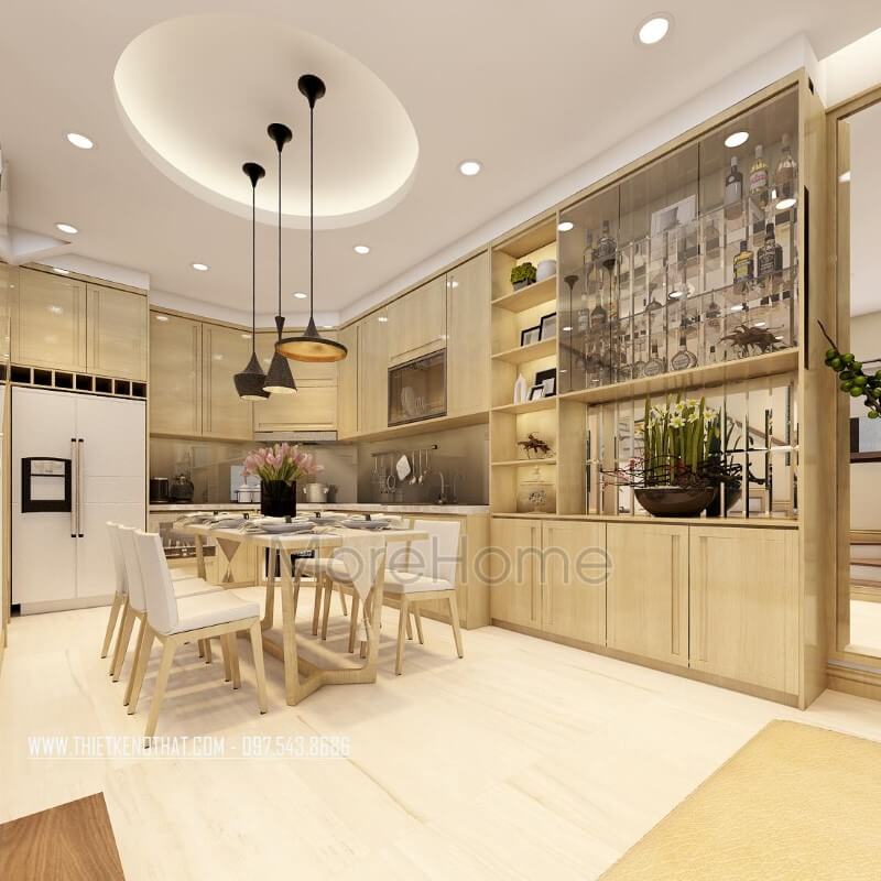 Nội thất phòng ăn liền bếp ở thiết kế đồng điệu màu sắc với tủ bếp gỗ chữ U hiện đại mang lại sự tiện nghi trong sinh hoạt hàng ngày Thiết kế nhà bếp tiện nghi sang trọng