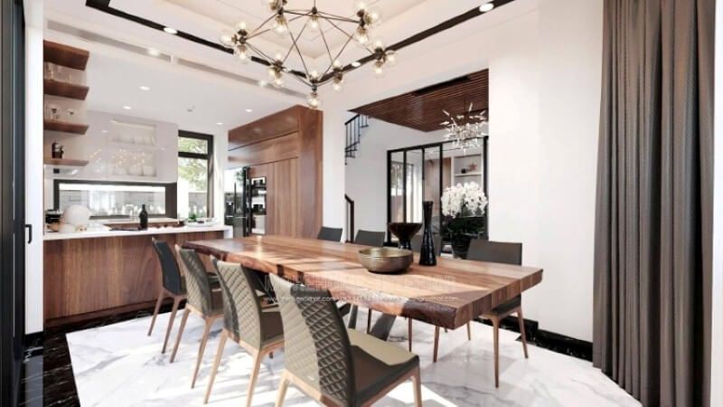 Ngoài điểm đặc biệt từ cách bố trí kệ trang trí, bàn đảo bằng đá granite màu trắng được thiết kế nhô ra ngoài lại là điểm đáng chú ý, một mặt vẫn đảm bảo diện tích để chủ nhân có thể trưng bày món ăn thỏa mái, một mặt bạn lại có thể vừa nội trợ vừa có thể trông nom con học một cách dễ dàng.