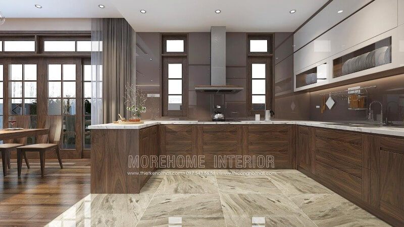 Thiết kế tủ bếp chung cư cao cấp với chất liệu gỗ óc chó nhập khẩu đóng vai trò chủ đạo tạo nên sự sang trọng, tinh tế, đồng thời thể hiện được sự đẳng cấp, gu thẩm mỹ của chủ nhân ngôi nhà