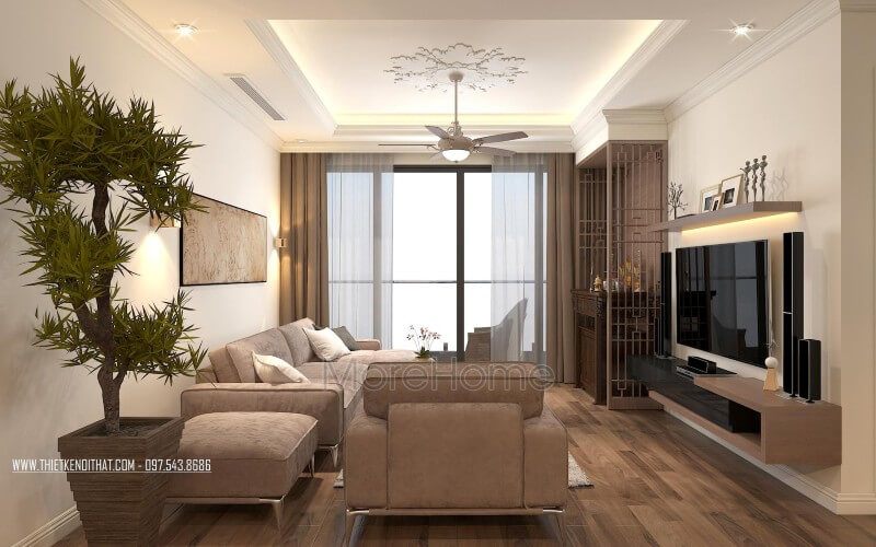 Phòng khách căn hộ thiết kế với bộ sofa nỉ chữ L màu xám được đặt ở không gian phòng khách rộng lớn là điểm nhấn ấn tượng tăng thêm sự sang trọng cho không gian