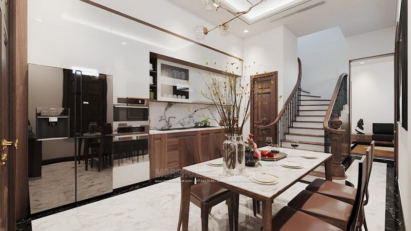 Thiết kế phòng ăn liền bếp phong cách hiện đại với nội thất gỗ óc chó cao cấp mang lại không gian ấm cúng, thân thiện cho người nội trợ