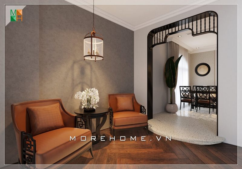 Mẫu thiết kế ghế sofa bằng gỗ tự nhiên óc chó cao cấp kết hợp đệm bọc da nhập khẩu màu nâu cam phong cách tân cổ điển, mang đến không gian vô cùng sang trọng