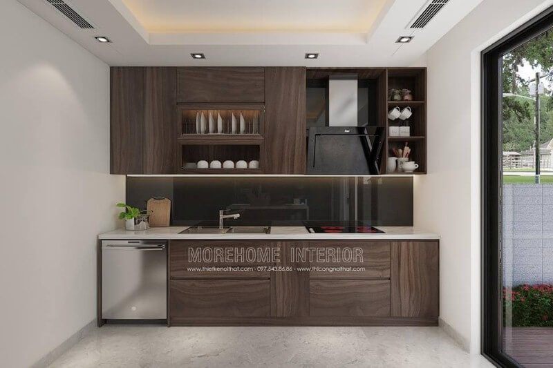 Tủ bếp gỗ công nghiệp chữ i hiện đại được bố trí khoa học với các thiết bị như máy rửa bát, bếp từ, bồn rửa và máy hút bụi để tối ưu hóa vị trí.